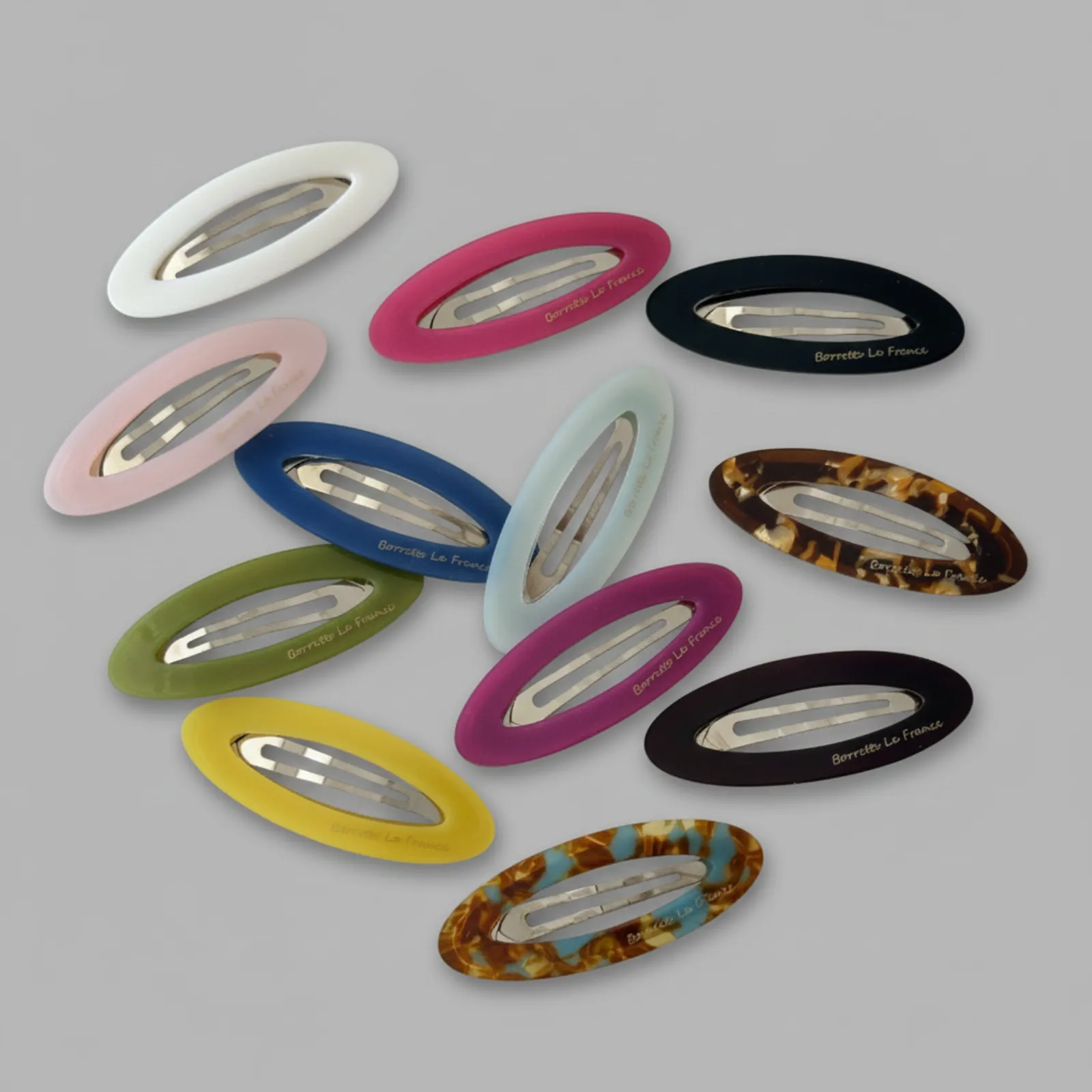 Custom openwork oval acetate snap hair clips